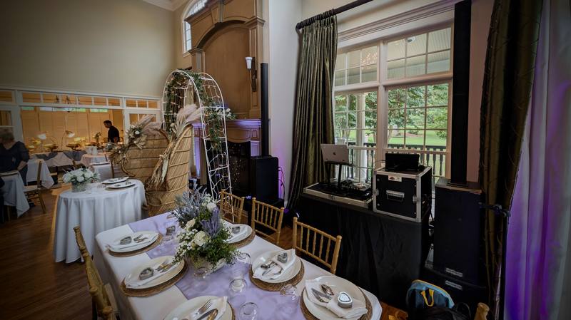 Estate reception with uplighting and formal tables