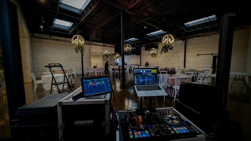 DJ booth with dual screens at modern venue