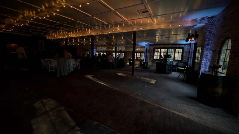 Setup at rustic brick venue with string lights